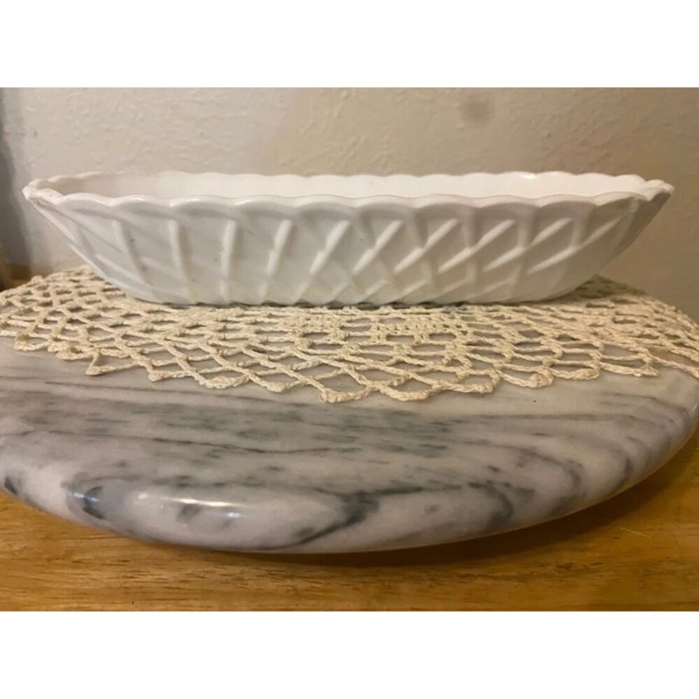Indiana Glass Company in their classic #622 "Pretzel" or basketweave pattern